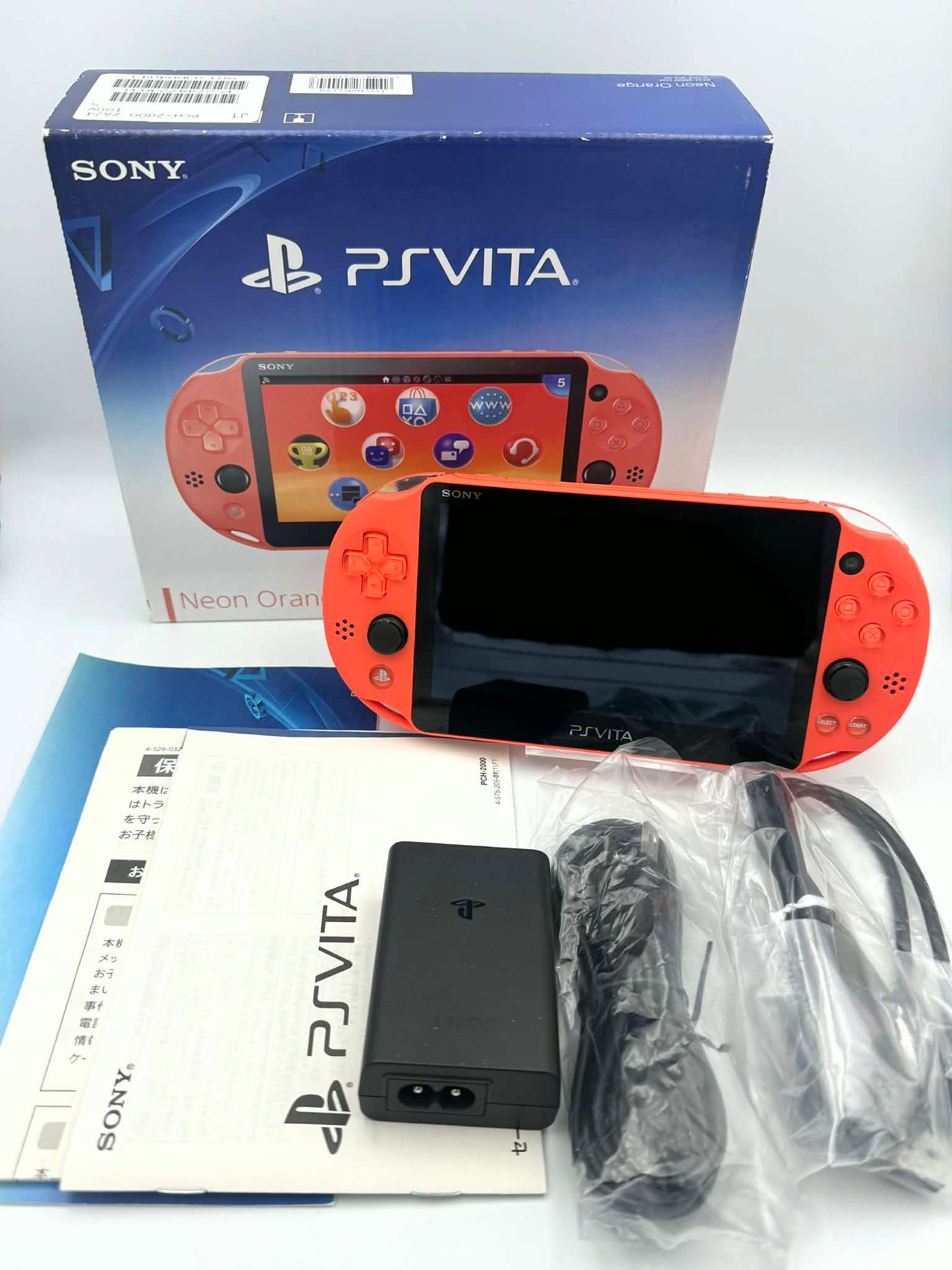PS Vita 2000 – ネオンオレンジ（箱入りコンプリート） 