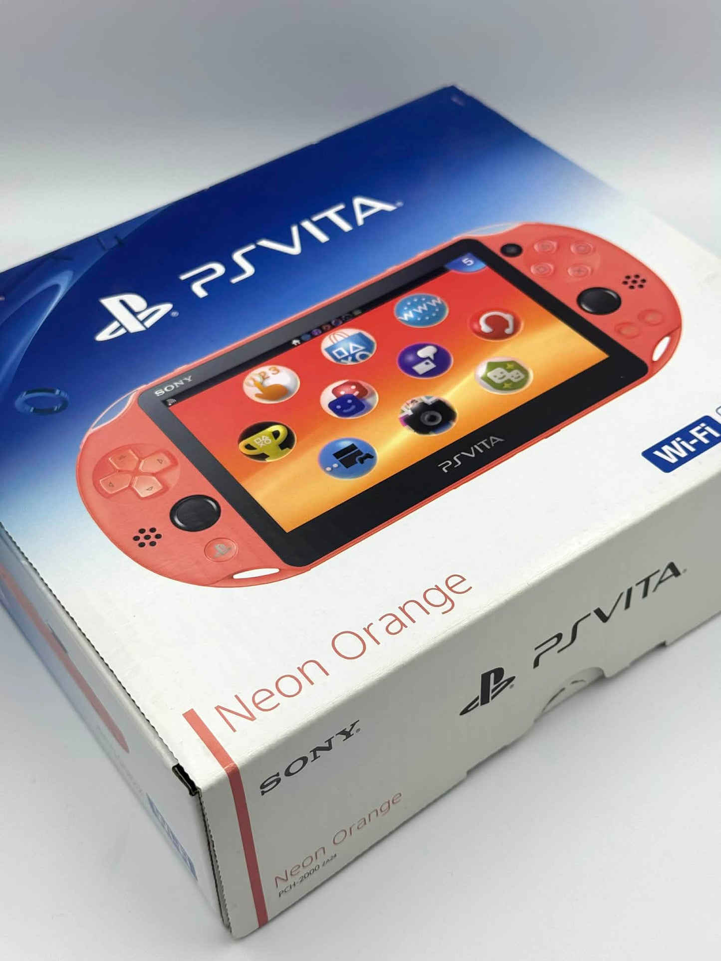 PS Vita 2000 – ネオンオレンジ（箱入りコンプリート） 