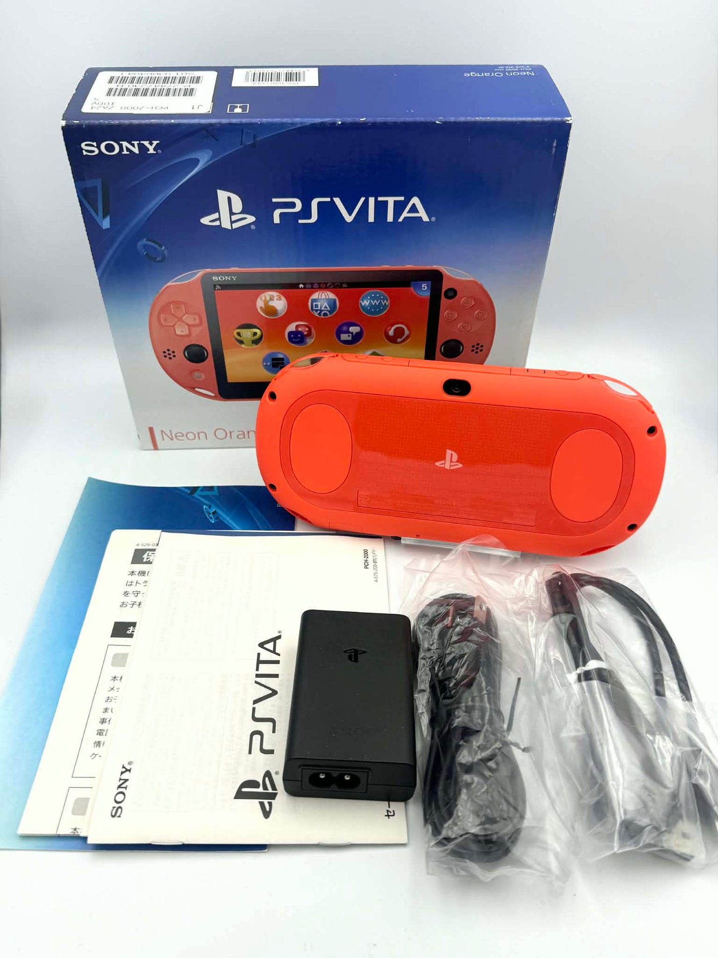 PS Vita 2000 – ネオンオレンジ（箱入りコンプリート） 